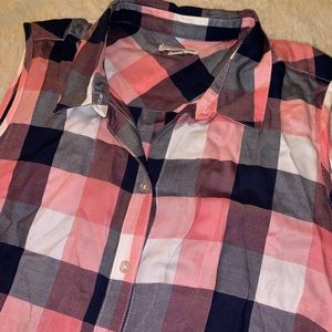 Checkered sleeveless button down tank top.